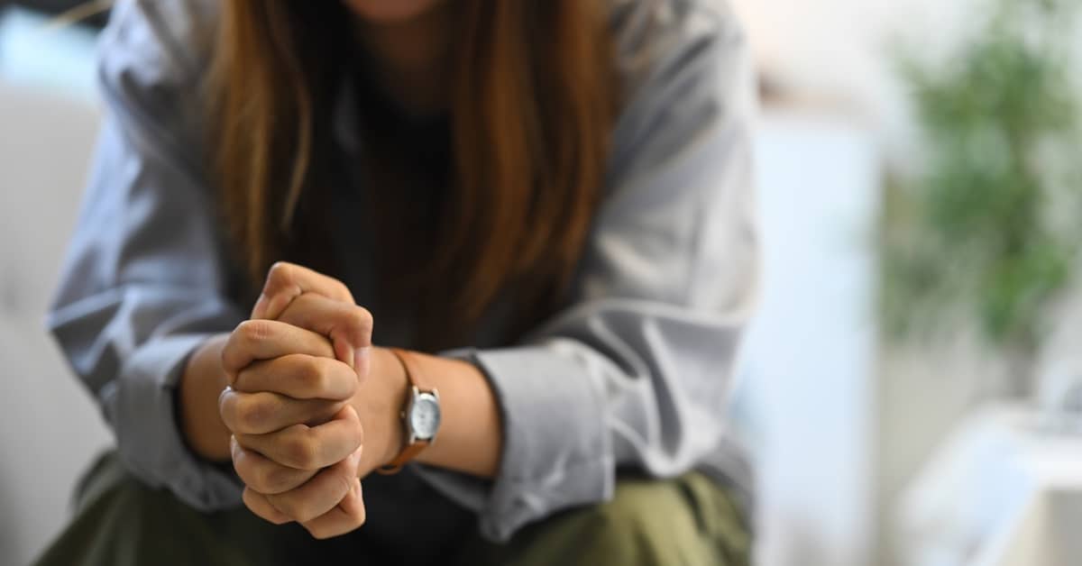 Concerned woman's hands. | Patrick Daniel Law